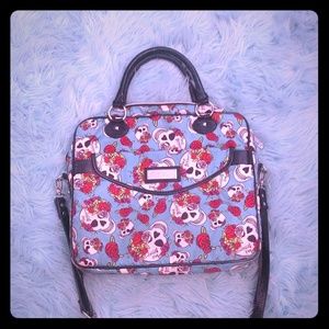 Betsey Johnson skull laptop case.